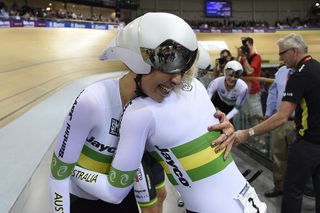 Members of the Australias team Melissa Hoskins L hugs Annette Edmondson as they celebrate after winning the Womens Team Pursuit Finals at the UCI Track Cycling World Championships in SaintQuentinenYvelines near Paris on February 19 2015 AFP PHOTO ERIC FEFERBERG Photo credit should read ERIC FEFERBERGAFP via Getty Images