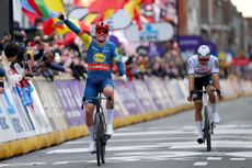 WEVELGEM BELGIUM MARCH 24 LR Mads Pedersen of Denmark and Team Lidl Trek celebrates at finish line as race winner ahead of Mathieu van der Poel of The Netherlands and Team Alpecin Deceuninck during the 86th GentWevelgem in Flanders Fields 2024 Mens Elite a 2531km one day race from Ieper to Wevelgem UCIWT on March 24 2024 in Wevelgem Belgium Photo by Tim de WaeleGetty Images