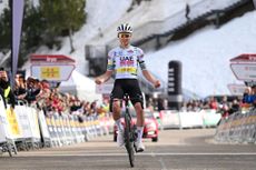 PORT AINE SPAIN MARCH 20 Tadej Pogacar of Slovenia and UAE Emirates Team Green Leader Jersey celebrates at finish line as stage winner during the 103rd Volta Ciclista a Catalunya 2024 Stage 3 a 1767km stage from Sant Joan de les Abadesses to Port Aine 1967m UCIWT on March 20 2024 in Port Aine Spain Photo by David RamosGetty Images